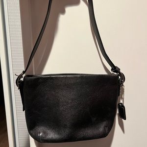 Small black Coach handbag.